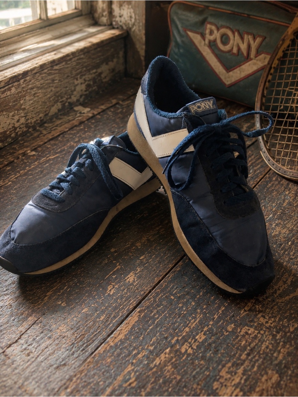 Vintage navy blue and white Pony’s retro running sneakers